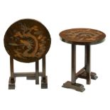 A pair of carved and stained wood folding occasional tables, c1930, the round top carved with a