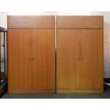 A pair of Stag light wood wardrobes, 1970s, 203cm h; 122cm l, maker's trade label Both in the same