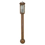 An English mahogany and line inlaid exposed tube stick or cistern barometer, Valanterio & Co