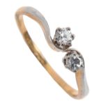 A diamond crossover ring, gold hoop marked 18ct PLAT, 1.9g, size M Good condition