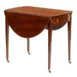 A Victorian mahogany and line inlaid pembroke table, on square tapering legs and brass castors,