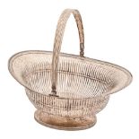 A Dutch silver basket, of pierced oval shape with beaded rim and reeded swing handle, 29cm l,