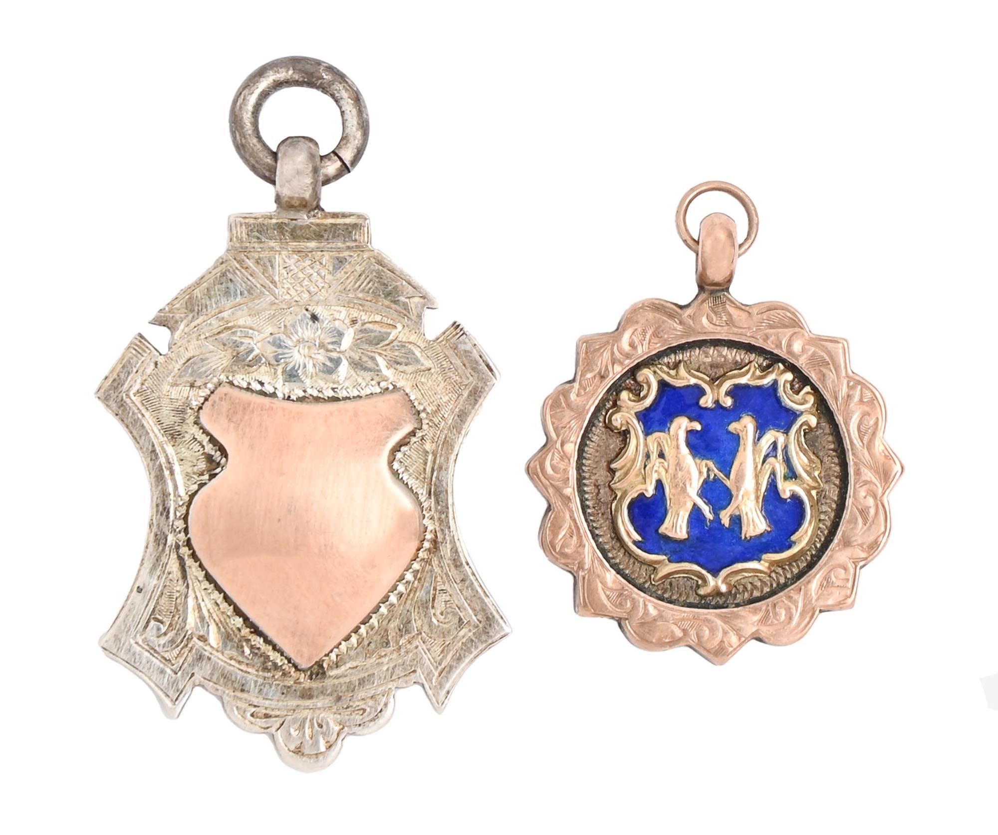 A 9ct gold and enamel sporting prize watch fob shield, the reverse engraved WINNERS 1912-13, 22mm