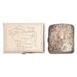 A George V silver cigarette case, 80mm, marks rubbed, Chester 1922 and a silver coloured metal