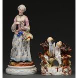 A French polychrome painted biscuit porcelain figure of a woman, c1870, on glazed circular base,