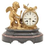 A French ormolu mantel clock, late 19th c, the bell striking drum cased movement with enamel dial