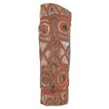 Tribal Art. A red and white pigment decorated wood ancestor carving, Papua New Guinea, mid 20th c,