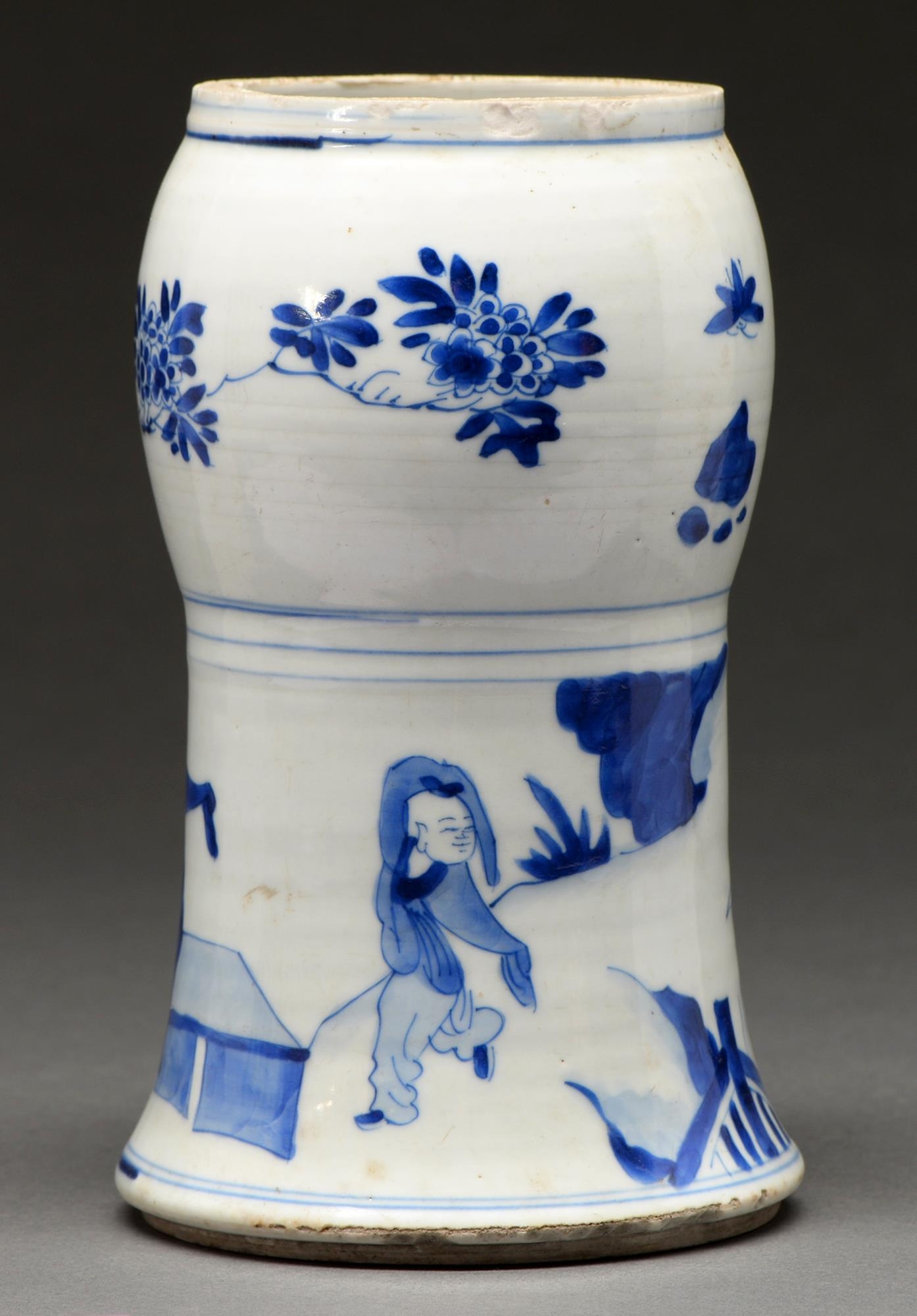 A Chinese blue and white beaker vase from a garniture, Qing Dynasty, Kangxi period, painted in two