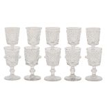 A set of eleven Anglo Irish wine glasses, second quarter 19th c, the bucket bowl with wide diamond