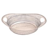A Dutch oval silver basket, in neo classical style with pierced sides and reeded rim, 31cm l, by