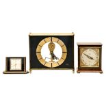A mahogany mantel timepiece and two lacquered brass timepieces, Elliott, Cyma and Kundo, mid 20th c,