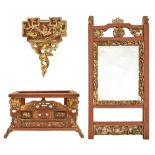 A Chinese carved, painted and giltwood miniature altar, a similar bracket shelf and a dressing