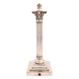 An Edwardian EPNS columnar oil lamp, the stepped foot engraved with crest, motto SINE DOLO and