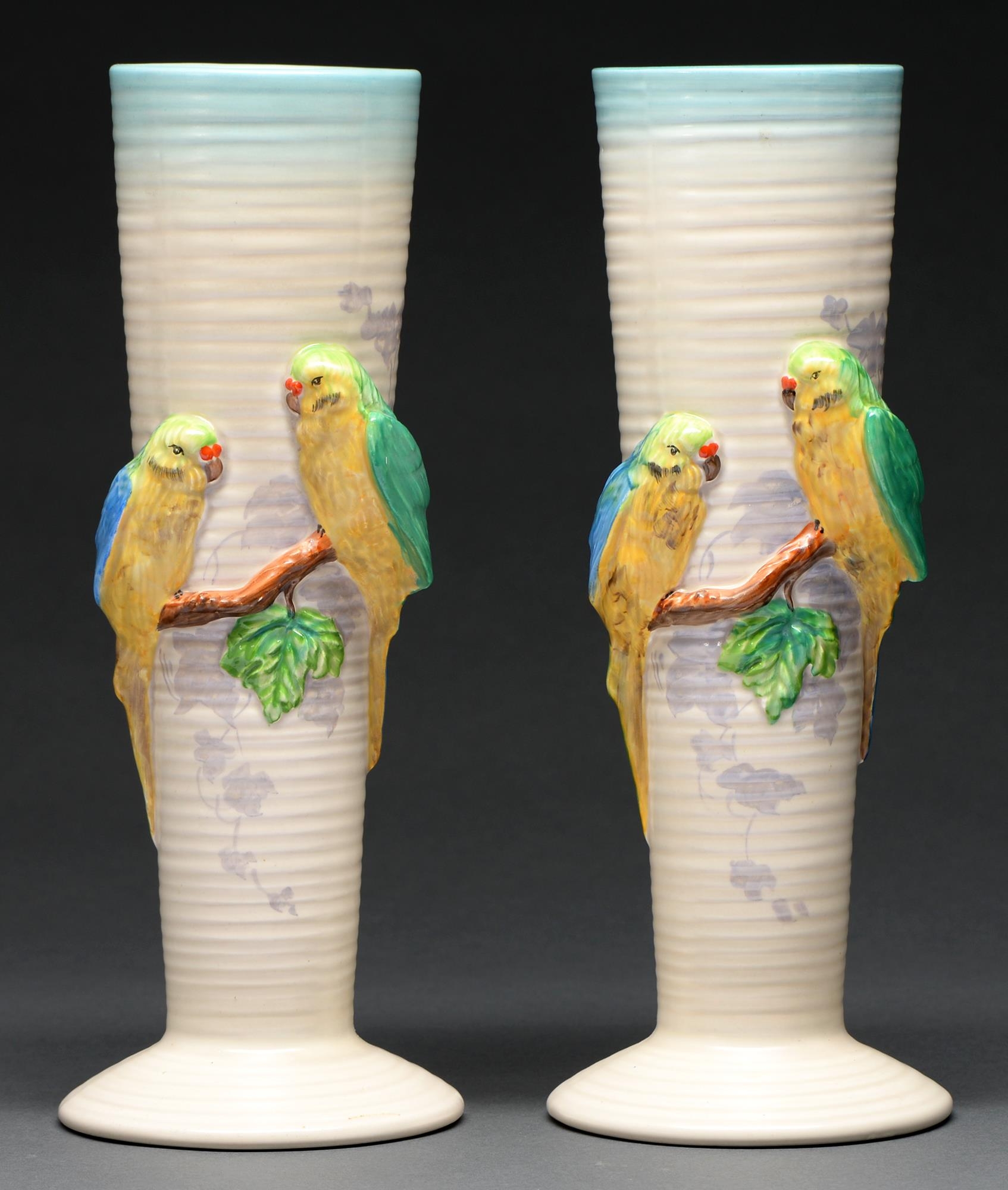 Clarice Cliff. A pair of A J Wilkinson Lovebirds vases, 1937-48, 32cm h, printed mark