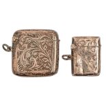 An Edwardian silver vesta case and a larger similar George V silver vesta case, 39 and 45mm h,