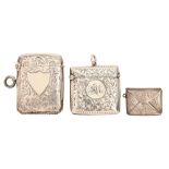 Two Edwardian and George V silver vesta cases, 40 and 50mm h, both Birmingham, by different