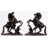 A pair of French bronze sculptures of the Marly Horses after the statues by Guillaume Coustou,