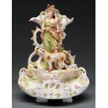 A Sitzendorf pierced porcelain vase, early 20th century, set with the figure of a classical maiden