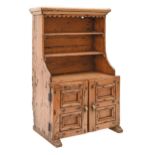 Miniature furniture. A pine dresser, 20th c, the lower part with panelled doors, 51cm h, 18 x 30cm