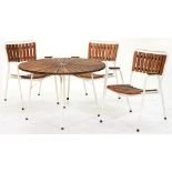 A white painted tubular metal round garden table, with teak slatted top and a set of three elbow