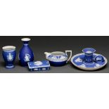 Five Wedgwood dark blue jasper dip wares, 19th c, comprising chamberstick, cream jug, two vases