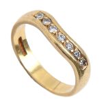 A seven stone diamond ring, in 18ct gold, marks obscured, 4.5g, size O Good condition