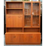 A G-Plan teak wall unit, incorporating bookcase and cocktail cabinet, 1970s, 198cm h; 162cm l Good