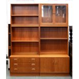 A G-Plan two piece teak modular wall unit, 1970s, 198cm h; 162cm l overall, maker's label Good