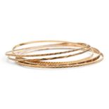 Five 9ct gold bangles, 67mm diam (internal), 12.8g Good condition