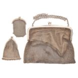 A Continental silver and chain mail evening bag and two similar silver coin purses, early 20th c,