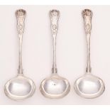 A set of three Victorian silver sauce ladles,  King's pattern, crested, maker's mark rubbed,