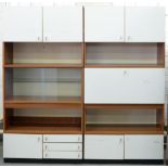 A two piece laminate modular wall unit, 1970's, 182cm h; 182cm overall Slightly marked