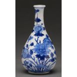 A Chinese blue and white baluster vase, Qing dynasty, Kangxi period, of bottle shape, painted with