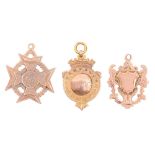 Three 9ct gold prize watch fob shields, plain or engraved reverse, various sizes and makers,
