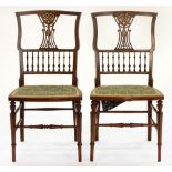 A pair of Edwardian mahogany and bone inlaid bedroom chairs, with pierced splat and spindle back,