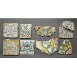 Nine Spanish wall tiles, 18th and 19th c, one with a moulded repeating floral design, incomplete