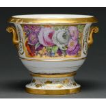 An English porcelain cache pot and stand, c1820, painted with a gilt ground panel of flowers, 15cm h