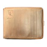 A George V 9ct gold cigarette case, engine turned, 10cm l, maker's mark rubbed, Birmingham 1930,