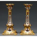 A pair of Royal Crown Derby Imari pattern dolphin candlesticks, late 20th century, 26.5cm high,