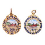 Veteran motoring. Two Edwardian 9ct and 18ct gold  and enamel wheel shaped prize watch fob