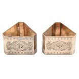 A pair of Victorian silver engraved triangular napkin rings, cut cornered, by William Evans,