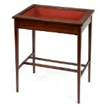 An Edwardian mahogany display table, crossbanded in satinwood and line inlaid, 66cm h; 38 x 53cm