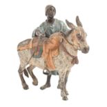 A cold painted Vienna bronze orientalist sculpture of an Arab donkey boy, probably Godde Brothers'