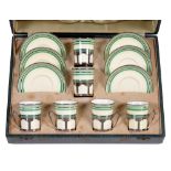 A set of six Copeland Art Deco bone china coffee cups, saucers and silver holders, c1930,