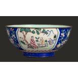 A Chinese Canton painted enamel blue ground famille rose bowl, 20th c, 18.5cm diam Good condition