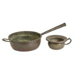 A Victorian copper saucepan, with conical handle, 82cm l and a Victorian pewter chamber pot,