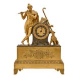 A French gilt bronze mantle clock, c1840, the engine turned dial with silvered chapter ring set in a