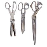 Three pairs of tichet and other draper's shears, two of steel, one of alloy, the last marked P