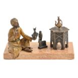A cold painted Vienna bronze orientalist statuette of an Arab antiquities seller, Bergman Foundry,