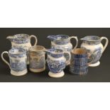 Seven blue and white transfer-printed earthenware and pearlware imperial measures, c. 1820-40, quart